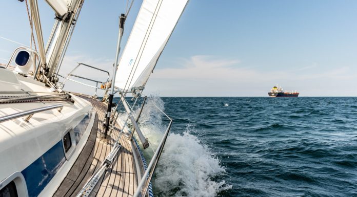 The Perfect Day Date: a Yacht Rental in Seattle sailboat splashing in the waves