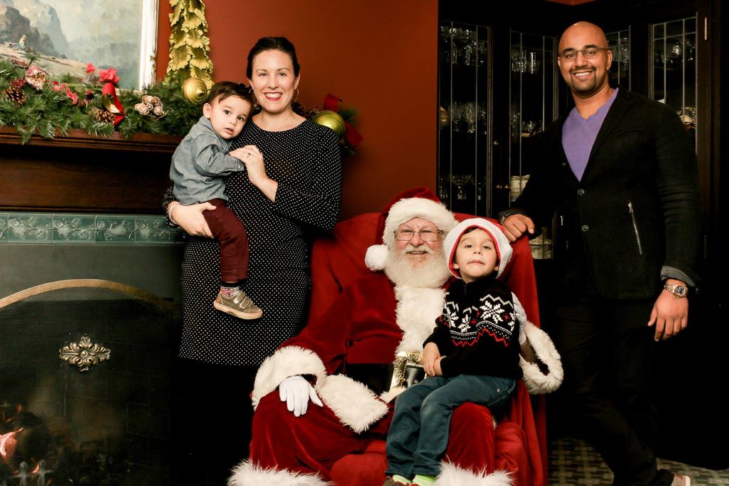 family with Santa at The Rainier Club holiday party